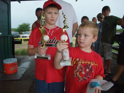 Image: Hunter and Bryce — Big brother Hunter Ballard and lil’ bro Bryce Ballard admire their trophies.