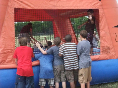 Image: I’m next! — The kids were excited to jump in the bounce house.
