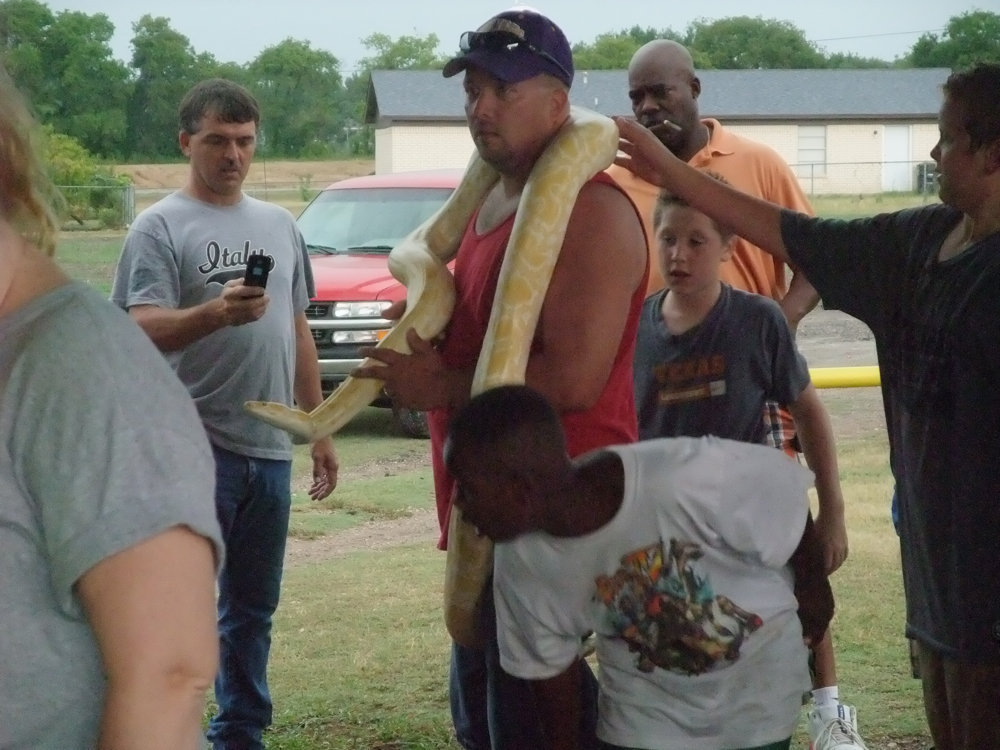 Image: Admiring the python — What a way to wrap up the 2009 IYAA Baseball/Softball season.