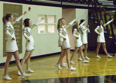 Image: Yell for the win — IHS cheerleaders lead the crowd in support.