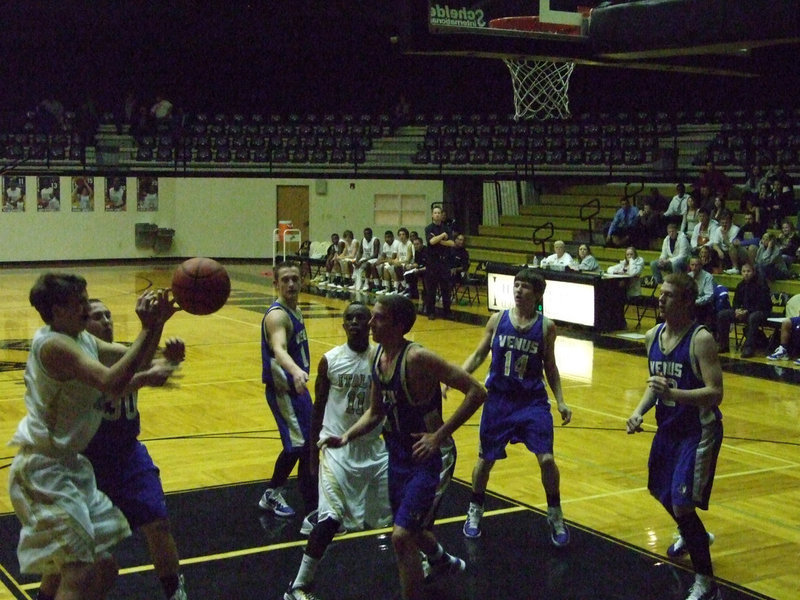 Image: Hopkins defends — Cole Hopins grabs the ball from the enemy.