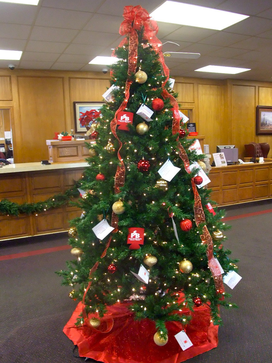 Image: First State Bank Angel Tree — Come chose an angel off this tree and brighten someone’s Christmas.