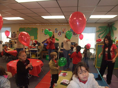 Image: Ready To Go Outside — These boys and girls are all ready to go outside and fly their balloons.