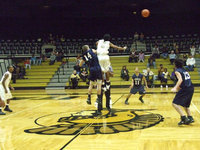 Image: Senior Dontavius Clemons #5 — Senior Dontavius Clemons #5 has no problem winning the opening tip-off in his last regular season game as an Italy Gladiator. Italy went on to win the contest 68-41 over the Waxahachie Advantage Eagles as they prepare for the playoffs.