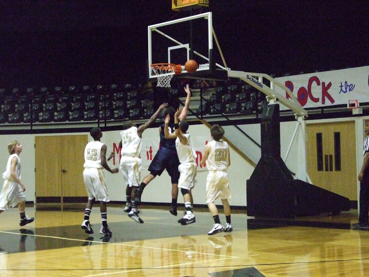 Image: Brave Bird — An Eagle player shows guts as he takes on Walton, Thomas, Anderson Gonzalez and Crownover.