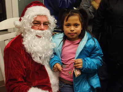 Image: What is your Christmas wish? — Santa had many little ones sit on his lap and have their picture taken.