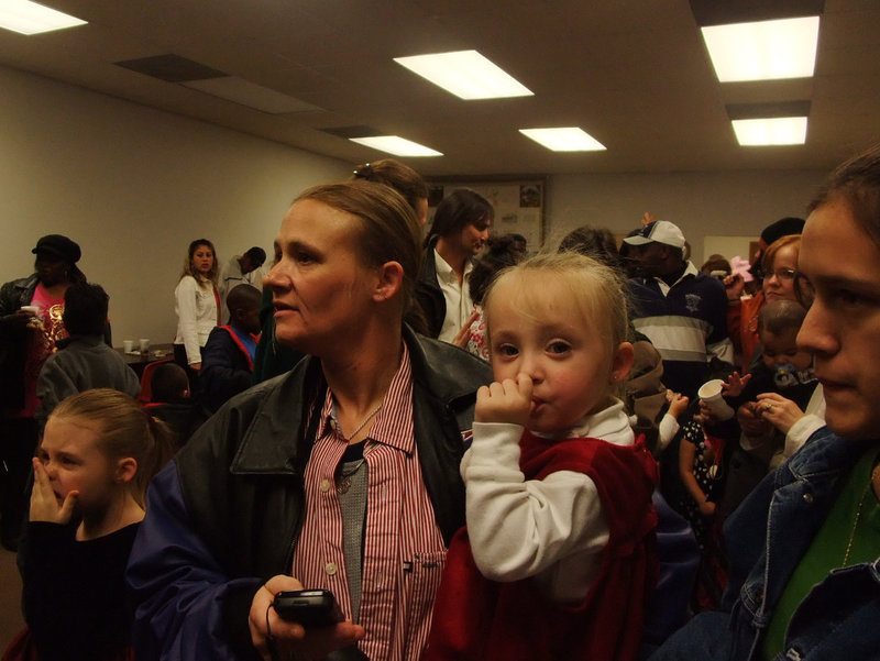 Image: Waiting to see Santa — The line wrapped around inside the Milford Senior Citizen’s Center.