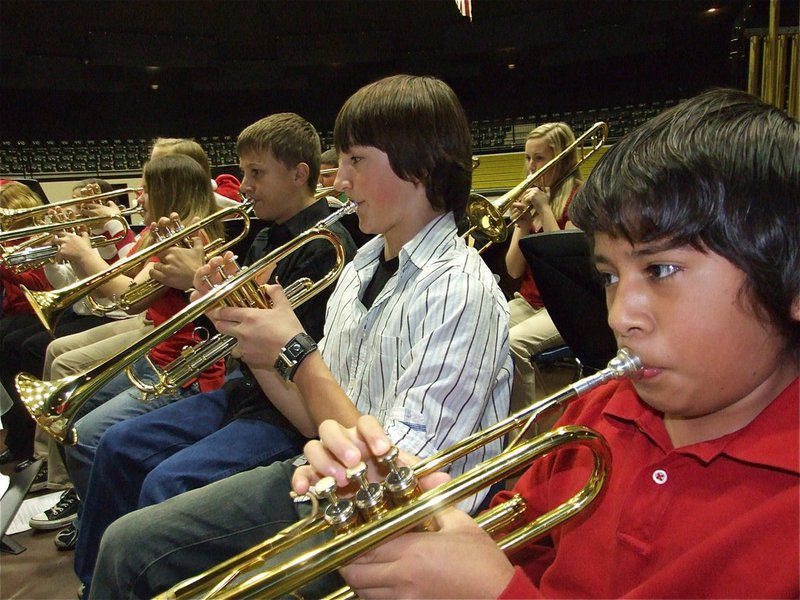 Image: Play that trumpet — Juan Suaste, Jacob Witte, Colton Petry and Tara Wallis on the trumpets.