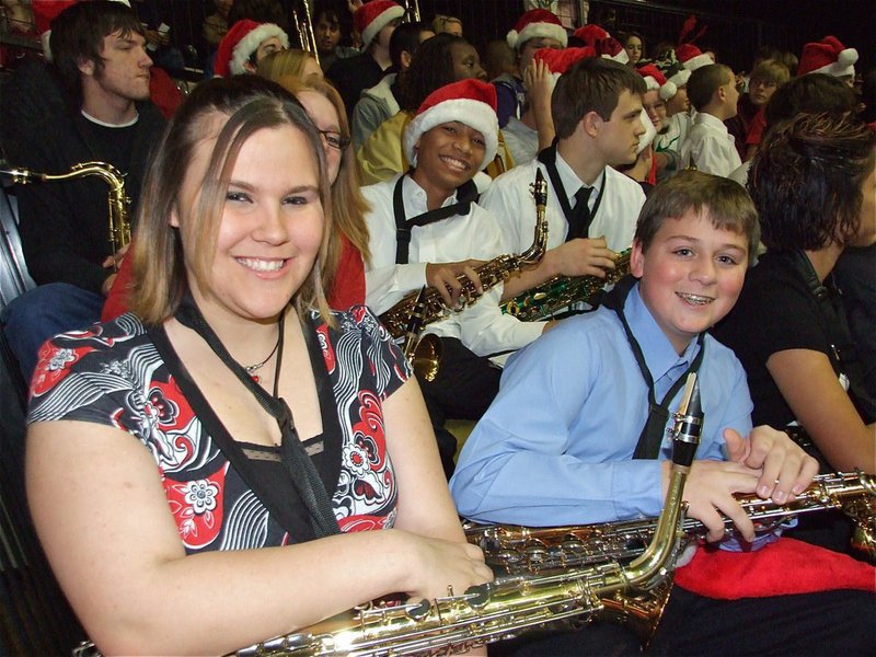 Image: Meagan and the band — Meagan Buchanan, Joseph Pitts, Austin Williams and the Gladiator Regiment Band get set to perform their Christmas Concert in front of a live audience.