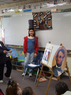 Image: Amber Hooker- Abraham Lincoln — Amber was one of the students chosen to read to the younger grades.