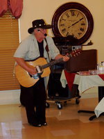 Image: Clyde Farrell — Clyde Farrell delighting the residents with song.
