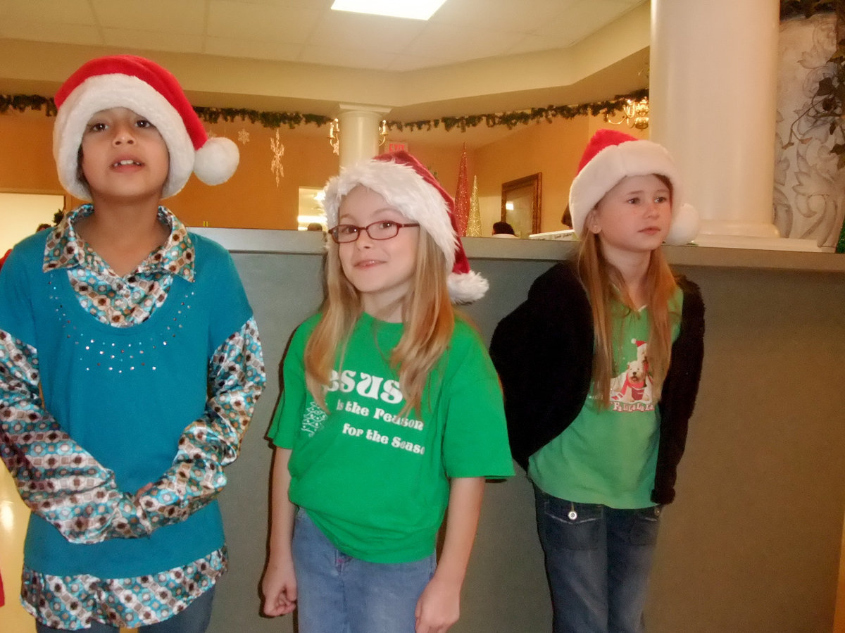 Image: Her Shirt Says It All — Jesus is the Reason for the Season!