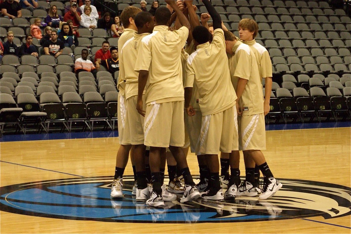 Image: How cool is this? — The Gladiators perform their pre-game chants at center court atop the Dallas Mavericks logo.