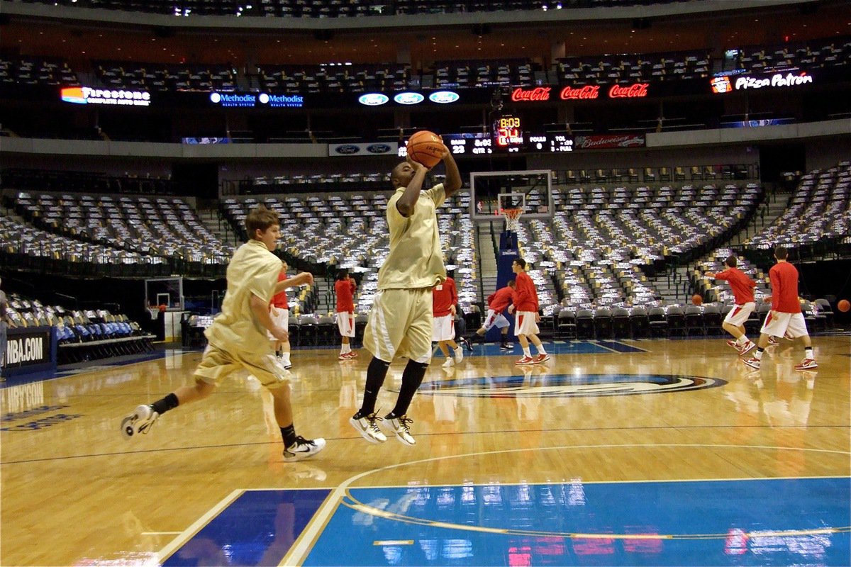 Image: Just like the Mavs — Gladiators Jase Holden and Jasenio Anderson get loose during the warmup.