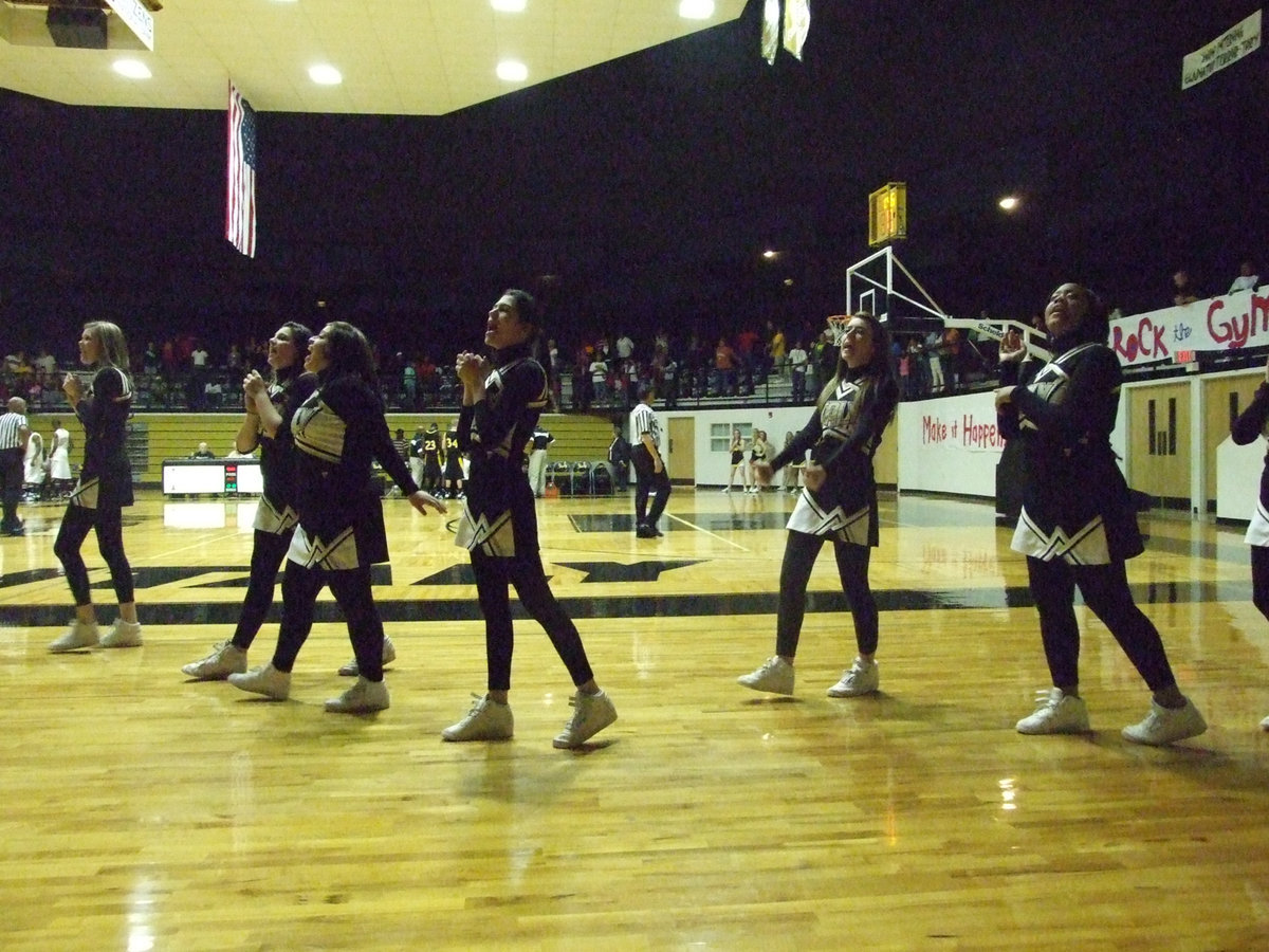 Image: Cheerleaders cheer! — Trying to keep everyone’s spirit and fire things up a bit are the Italy High School Cheerleaders.