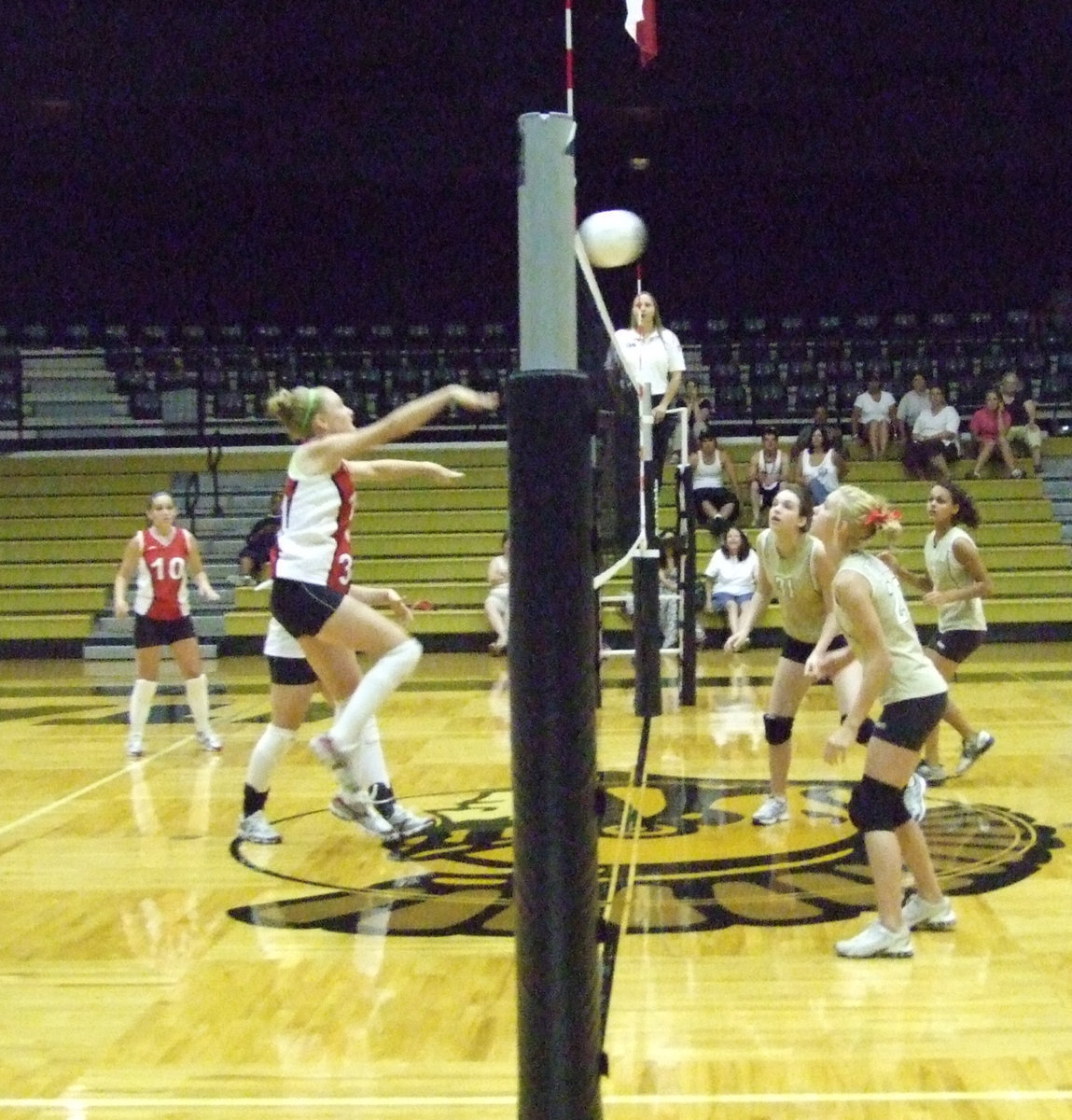 Image: Maypearl gets a hit — Maypearl player gets a point with this one.  However, the Lady Gladiators came back with a few more hits.