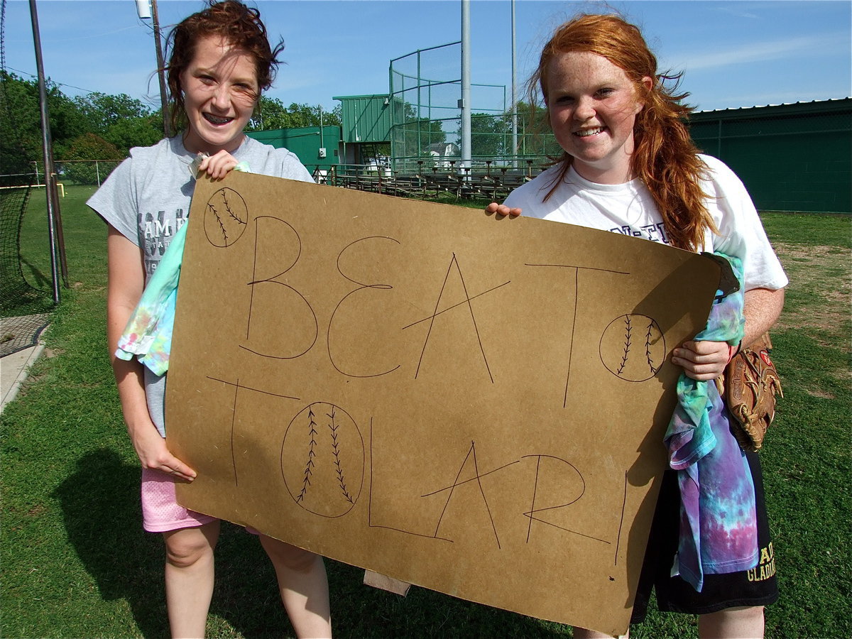 Image: Lady Gladiators Bailey Bumpus and Katie Byers have a message — Lady Gladiator softball players Bailey Bumpus and Katie Byers try to inspire their teammates during Thursday workouts as Italy prepares to take on the Tolar Lady Rattlers for the Class A area championship.