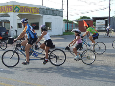 Image: Bicycle built for three — Some of the routes include family rides of 12 miles.
