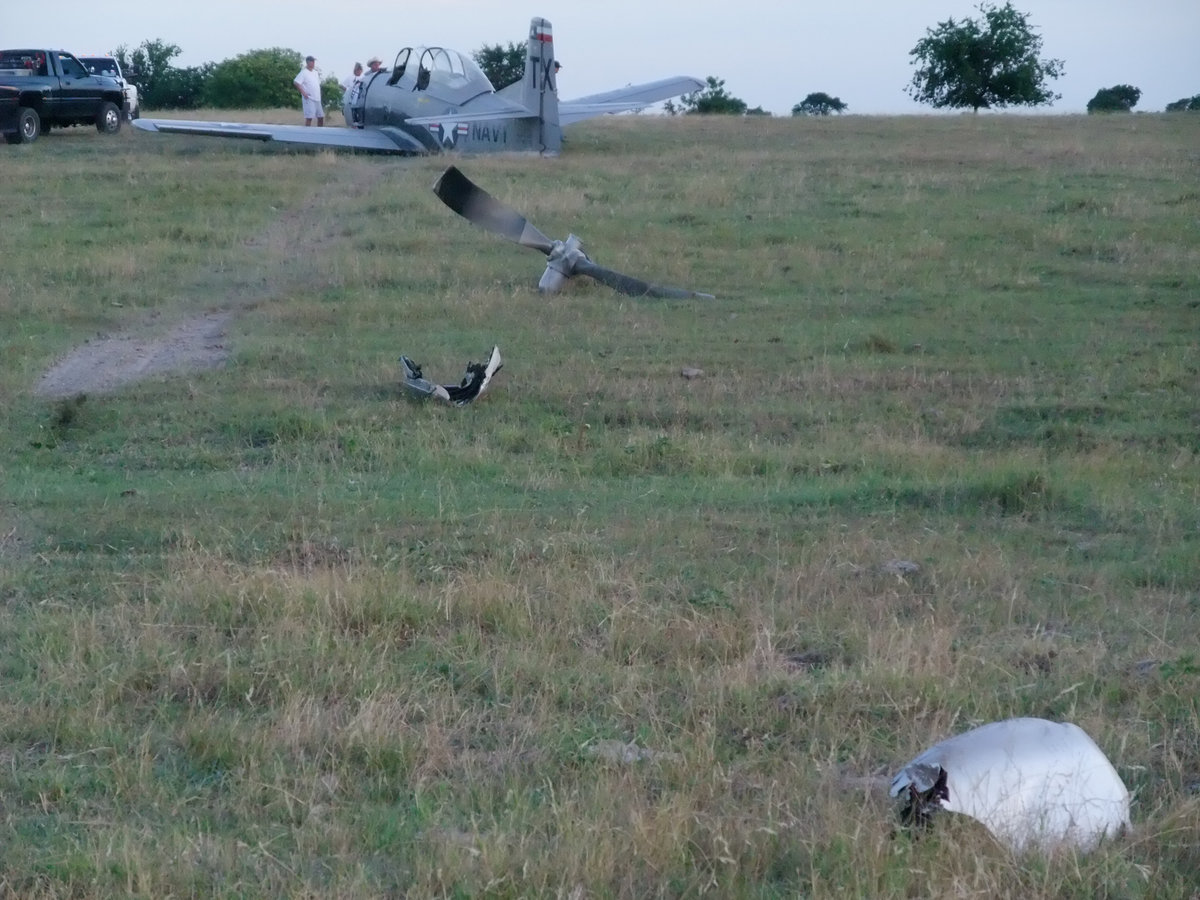 Image: A restored Navy/Air Force prop plane crashes and leaves a lasting mark — A restored Navy/Air Force prop plane crashed on it’s way to perform in an air show. Thanks to quick actions by the pilot, the crash marks the second time the pilot has survived a plane crash.