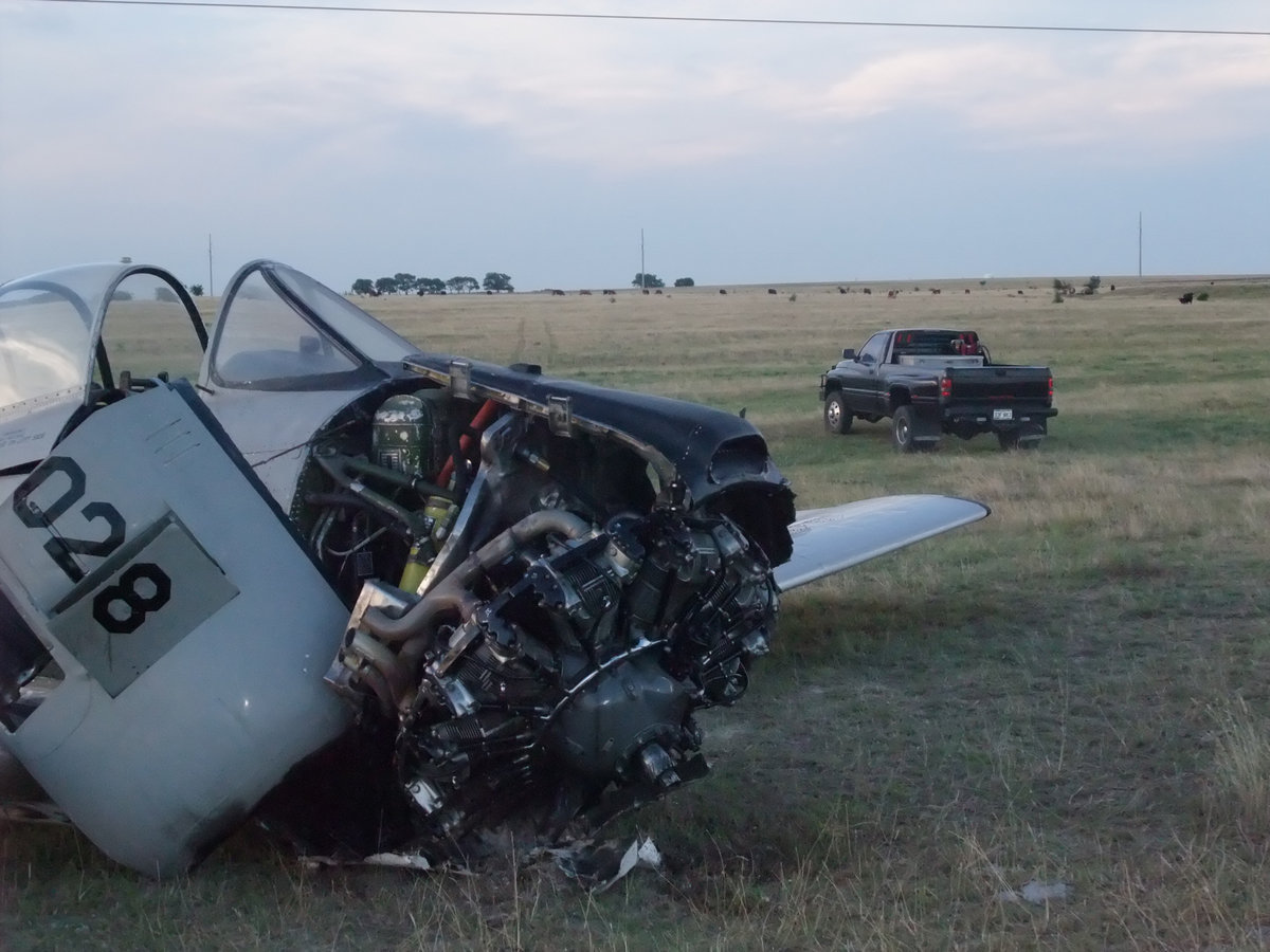 Image: Grounded plane — The nose of the aircraft ripped apart on the landing sending the propeller flying.