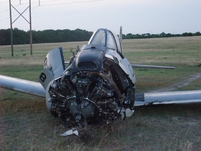 Image: Front end damage — The aircraft was mostly intact after the landing but was heavily damaged.