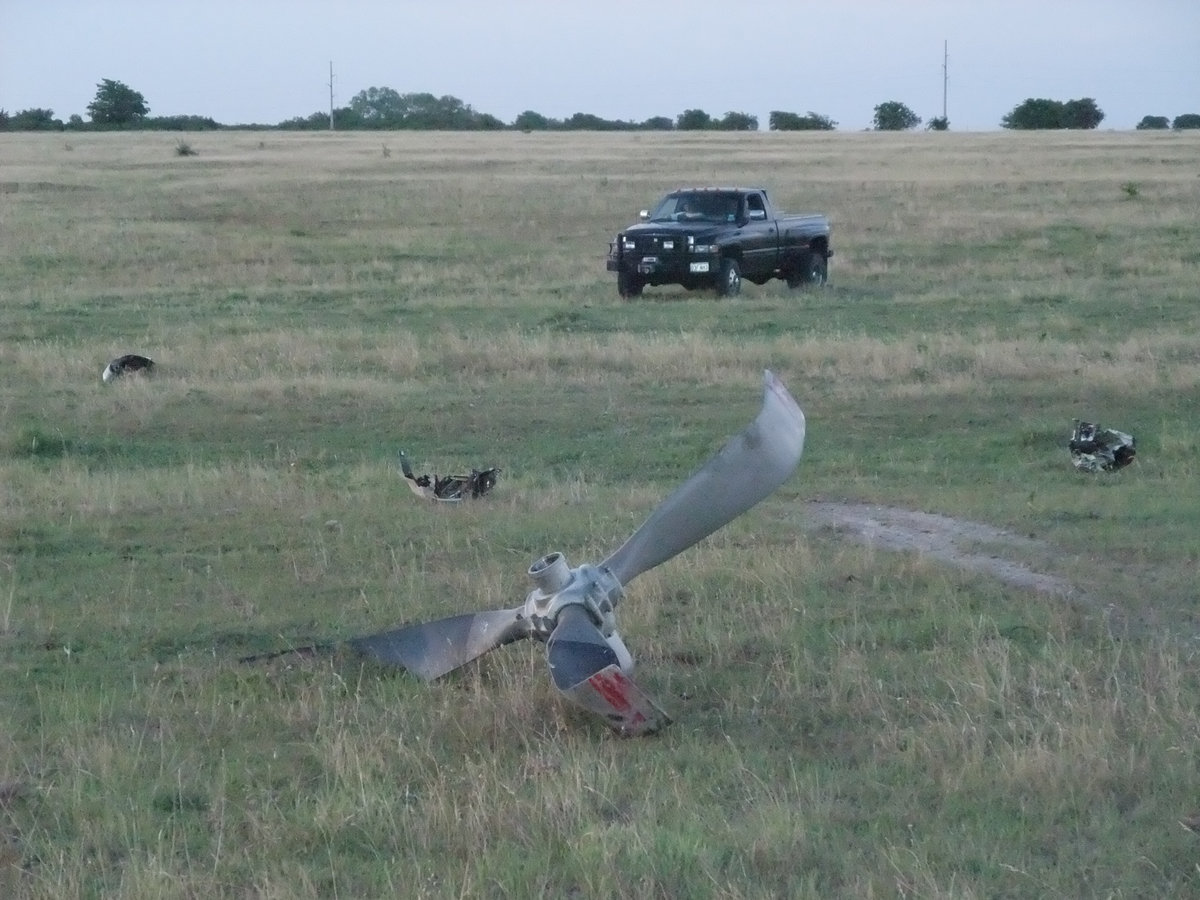 Image: Field of vision — Brentley Byers scans the open field for remnants of the aircraft.