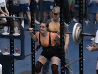 Image: Preparing to squat — Kaytlyn Bales gets ready to execute her lift.