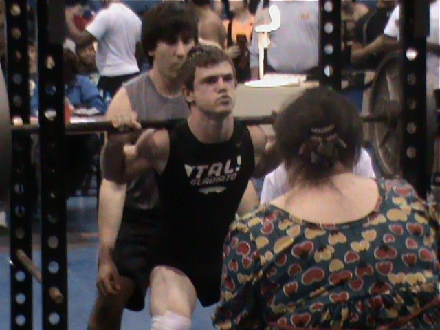 Image: Chase goes for it — Chase Hamilton takes on the squat cage at the Rice powerlifting meet.