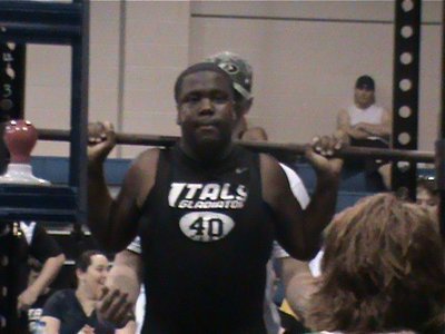 Image: Adrian Reed — Adrian helps to pump up the Italy powerlifting program.