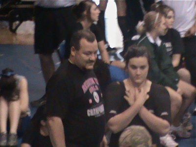 Image: Awaiting the results — Coach Craig Bales and his daughter Kaytlyn Bales await the official results.