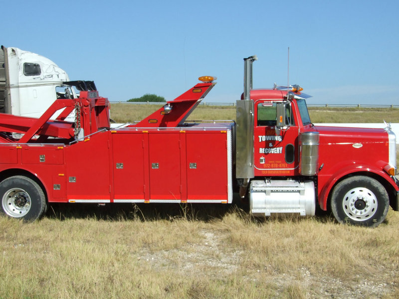 Image: DRP Wrecker of Ennis — DRP Wrecking Company out of Ennis was there on the scene to assist in uprighting the semi.