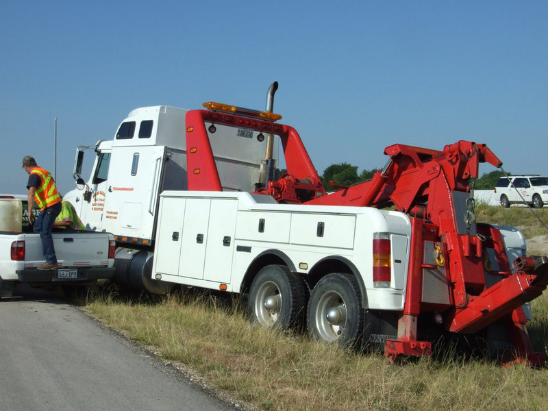 Image: Keith Helm’s Garage Wrecker — Keith Helms with Keith Helm’s Garage was also on the scene to help up right the truck.