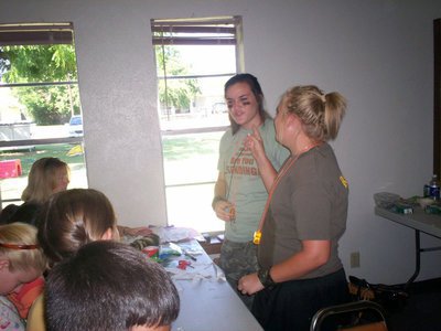 Image: Bales and Burke — Volunteer Staff Sargeants, Kaytlyn Bales and Drenda Burke, help these young Bible Soldiers with their crafting duties.