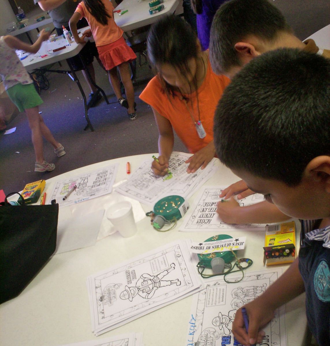 Image: The Color Guard — Campers color pictures of their favorite soldiers during the Central Baptist Church of Italy’s Vacation Bible School Boot Camp.