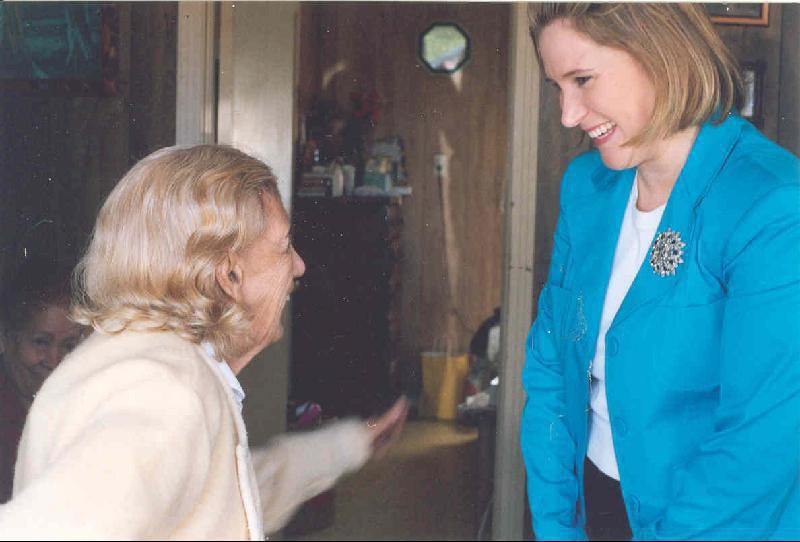 Image: Visit brings a smile — Delivering lunch through Meals on Wheels brings more than food into the lives of those you visit.