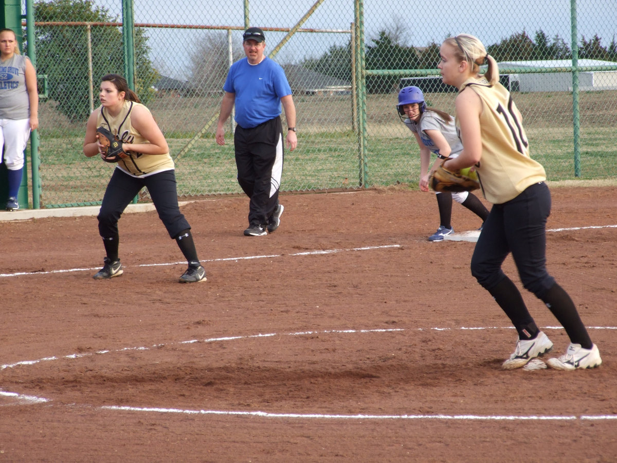 Image: Cori &amp; Courtney  — Italy’s 3rd Baseman, Cori Jeffords, and Pitcher, Courtney Westbrook, try to do a little damage control.