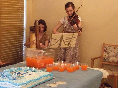 Image: Great Granddaughters — These two great granddaughters of June’s came to play their beautiful music for June on her momentous occasion.