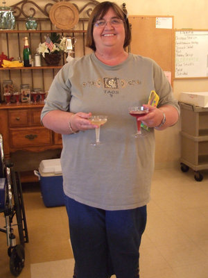 Image: Sparkling Grape Juice Anyone? — Carolyn Powell is ready to party with June and friends.