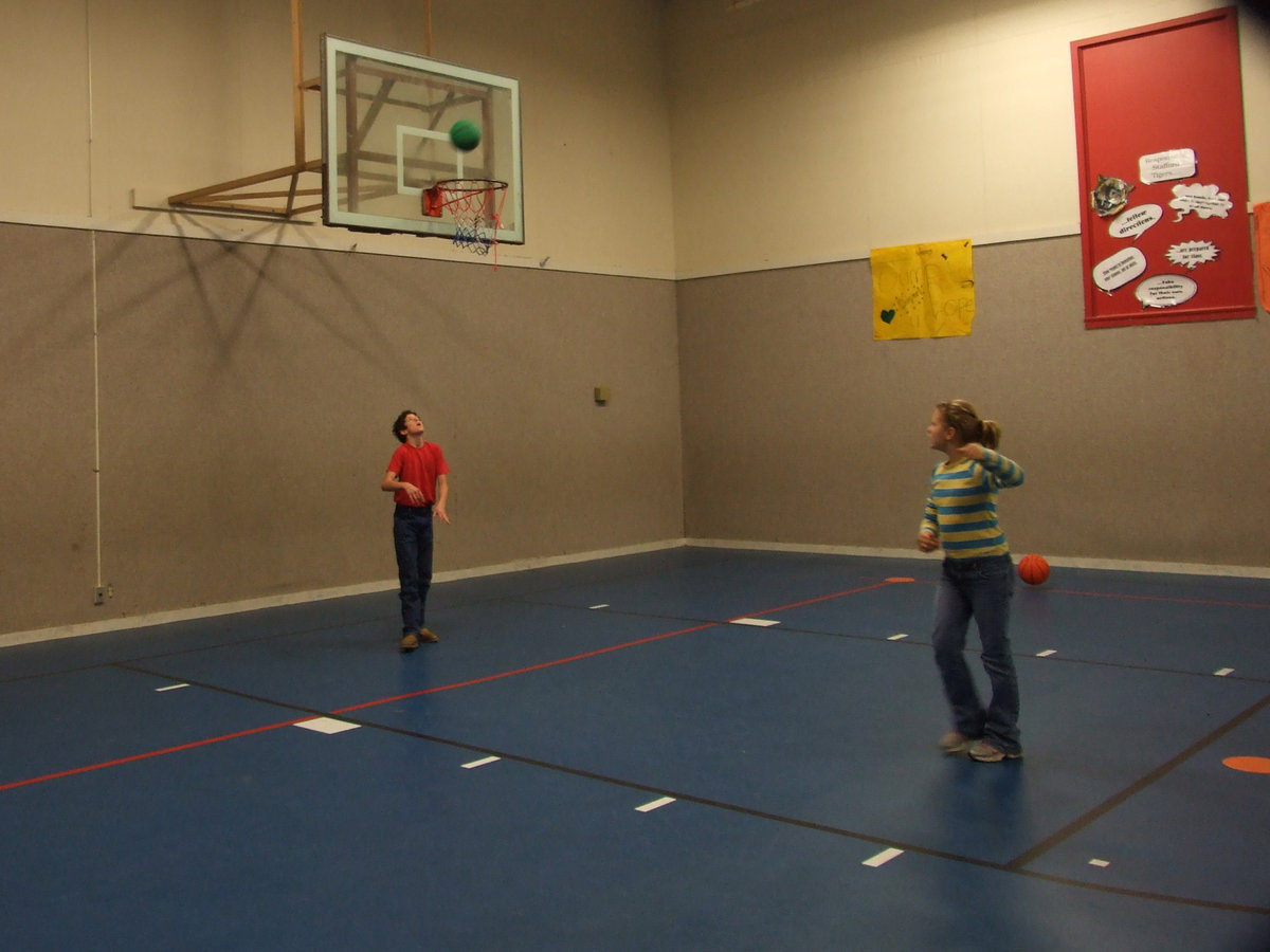 Image: Hoops for Heart — Students try to make as many baskets as they can to raise money for the American Heart Association.