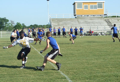 Image: Corrin — Corrin Frasier defends against a Blooming Grove receiver.