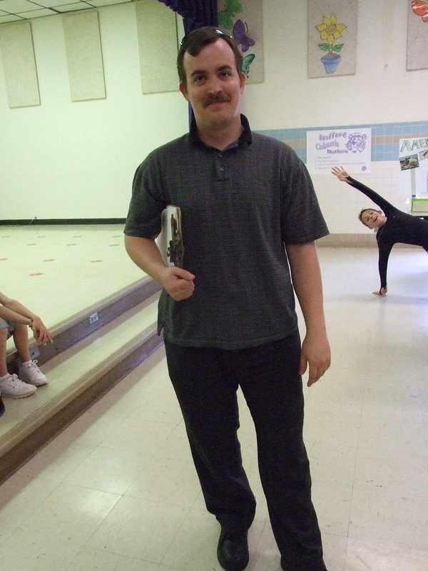 Image: Jonathan McLean — Jonathan McLean has clipboard in hand and is ready to grade the science projects.