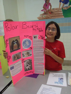 Image: Kasey Bales — Kasey did her project on Polar Bears, “I learned that they are carnivores and they live by the artic. When the sea is frozen over they live by the ice and when it melts they go back to shore to live.”