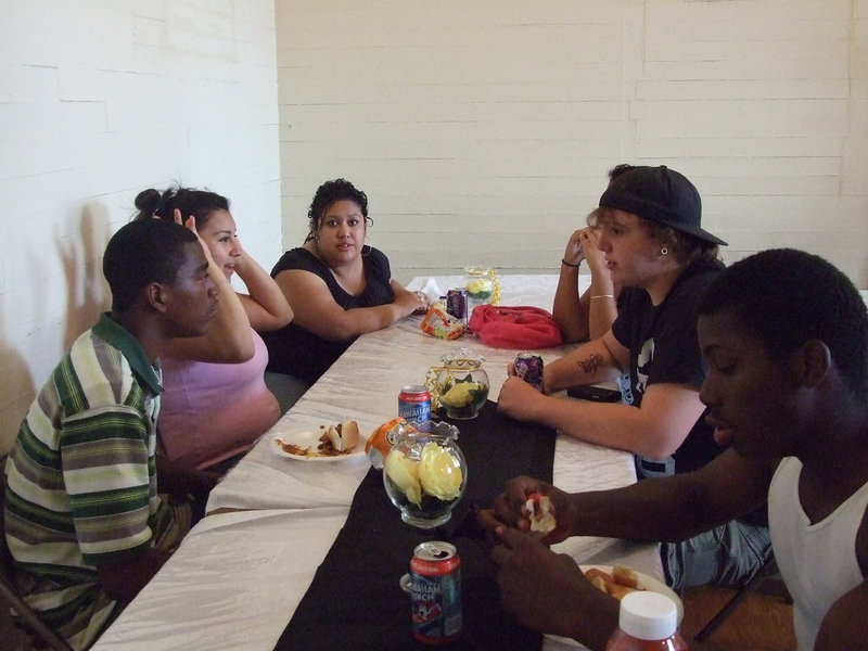 Image: Graduates gathered — Students like Darrin Moore, Shane Cotter, Curtis Cole, Eva DeLaHoya and Susana Ramos waited for Rev. Issac to give a message.