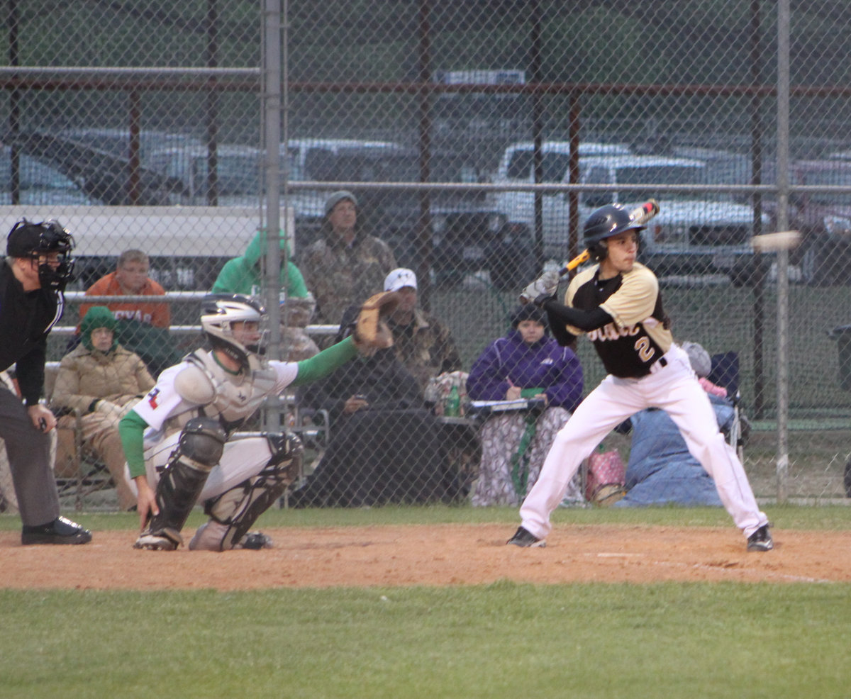 Image: Caden is ready — Caden Jacinto steadies as the ball comes down the center.