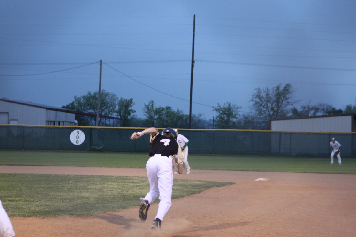 Image: Running for Caden — Alex DeMoss pinch runs for Caden Jacinto.