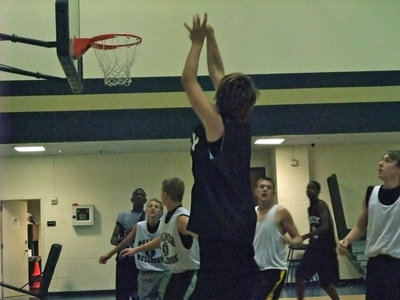 Image: Cole shoots — Cole hopkins puts up a shot against Palmer during a strong showing by the Italy J.V. Squad.