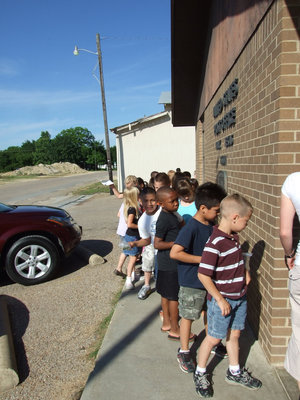 Image: Here Come The Kids — The students were lined up and ready to mail their letters.
