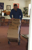 Image: Friend, Bill Youngblood — Bill Youngblood was always helping-anywhere he could.  Here, you see Bill loading boxes for the IMA Food Pantry.  He was always lending hand.  Bill will be missed.