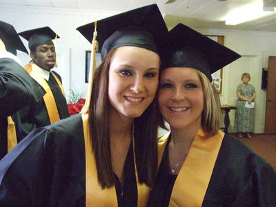 Image: Annalee and Lindsey — Annalee Lyons and Lindsey Brogden take a minute before the ceremony for a smile.