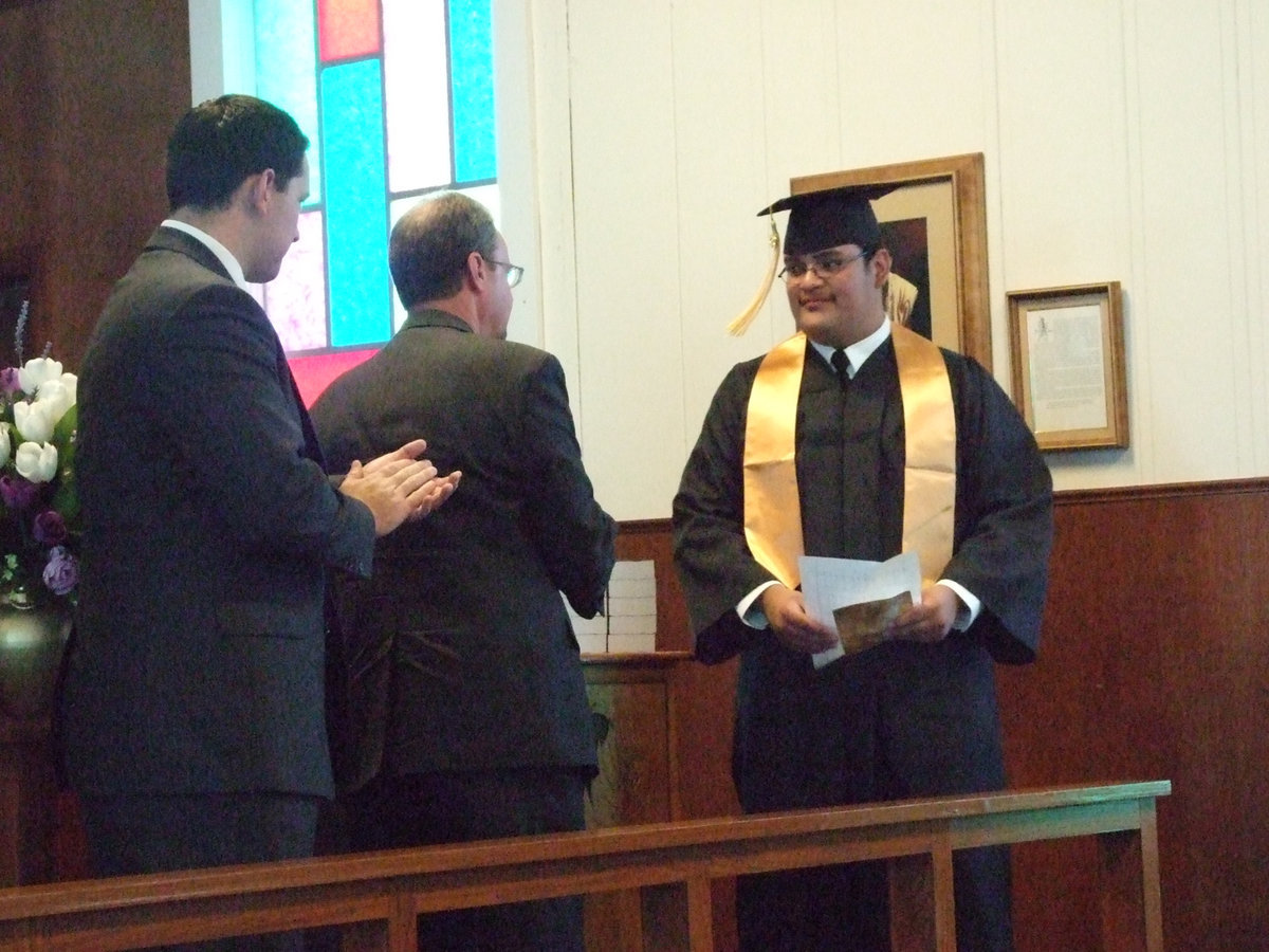 Image: Raymond Arriaga — Raymond was the first in line to receive his bible.